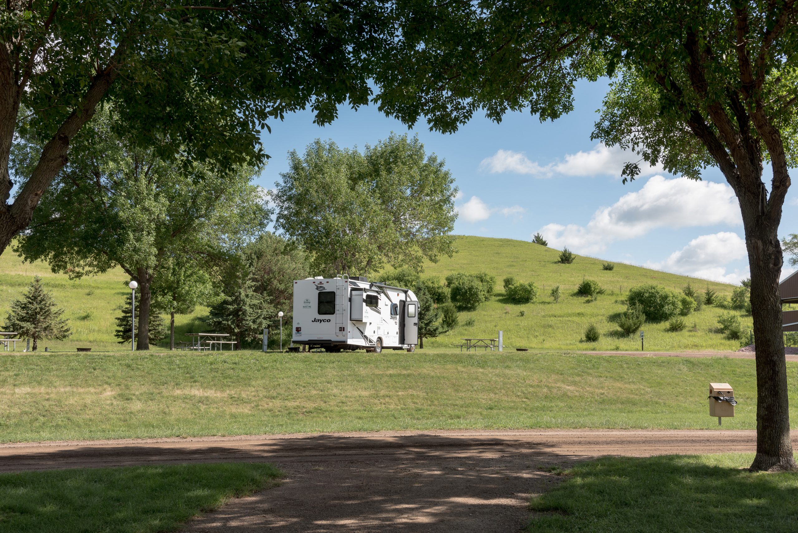 Small motor home in a pull thru site