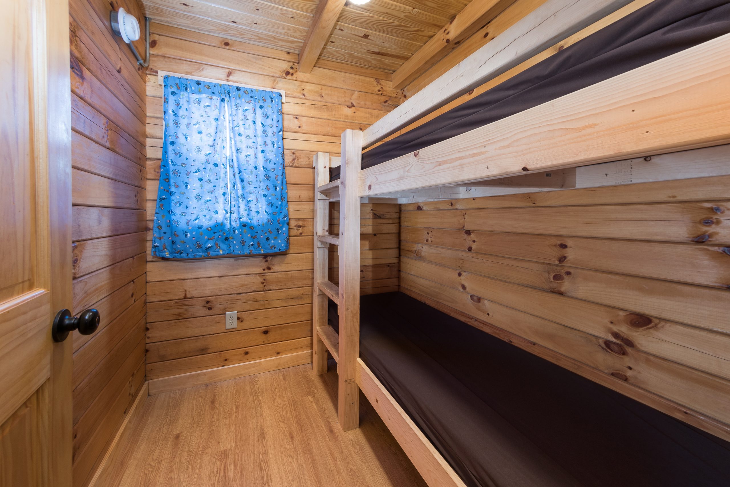 Bunk room in retreat. Single bunks on the right